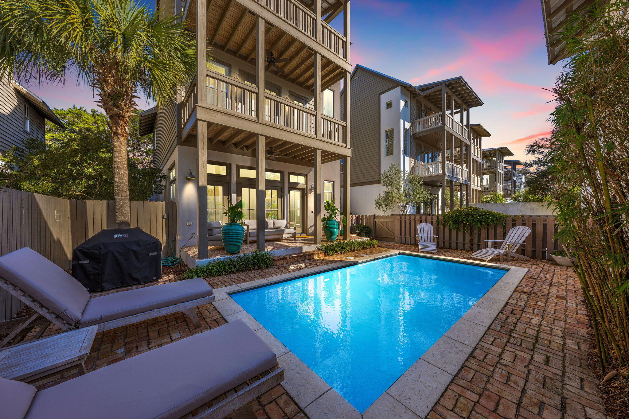 Prime Opportunity Steps from Rosemary Beach! Ideally situated at the edge of Inlet and Rosemary Beach, 106 Winston Lane offers the perfect blend of privacy, rental potential, and walkable beachside convenience. Just one block from a beach access point and a five-minute stroll to the shops and restaurants of Rosemary Beach, this spacious property is also a short bike ride to Alys Beach, Seacrest, and other iconic 30A communities.Effortlessly blending modern coastal elegance with relaxed Boho textures and a hint of Soho chic, the interiors are as stylish as they are functional - designed for both upscale getaways and high-performing vacation rental appeal. The main residence features three king suites and a charming bunk room with two sets of twin-over-twin bunks. The open-concept layout flows seamlessly to a private outdoor patio and heated pool - ideal for group gatherings or quiet relaxation.
A separate carriage house adds even more flexibility, offering a studio-style layout with a defined sleeping area and queen sleeper sofa - perfect for guests or additional rental income.
This turnkey property is well-suited for large families or vacationing groups, with generous indoor and outdoor living space, a large central kitchen, and a layout designed for connection and comfort.
Rental-ready and located in one of the most desirable stretches of Scenic 30A, 106 Winston Lane combines lifestyle, location, and investment appeal.
Private pool, one-block beach access, and strong rental potential make this a standout opportunity.
No HOA = more freedom and fewer expenses. Investors will appreciate the flexibility for short-term rentals, no monthly dues, and the ability to manage the property without restrictive oversight - maximizing both rental income and long-term value.