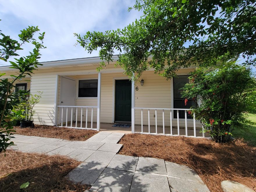 Get your backpack beach chairs ready!  Hidden Villas, Unit 6 is just blocks from the beautiful sugar-white sand beaches of Florida's Emerald Coast!  Hidden Villas is a 16 unit (4 quad-plex) community, WITH NO SHORT TERM RENTALS ALLOWED! You will have peace and quiet in your year round, or vacation home property.  The community has nice landscaping and a covered pavilion offering space for a larger gathering of family or friends.  Enjoy morning coffee in the peace and quiet of your porch, without the distractions of vacationers coming and going! It has a lower HOA fee than most other units in the area.  Act quickly so that you can enjoy this summer at the beach!