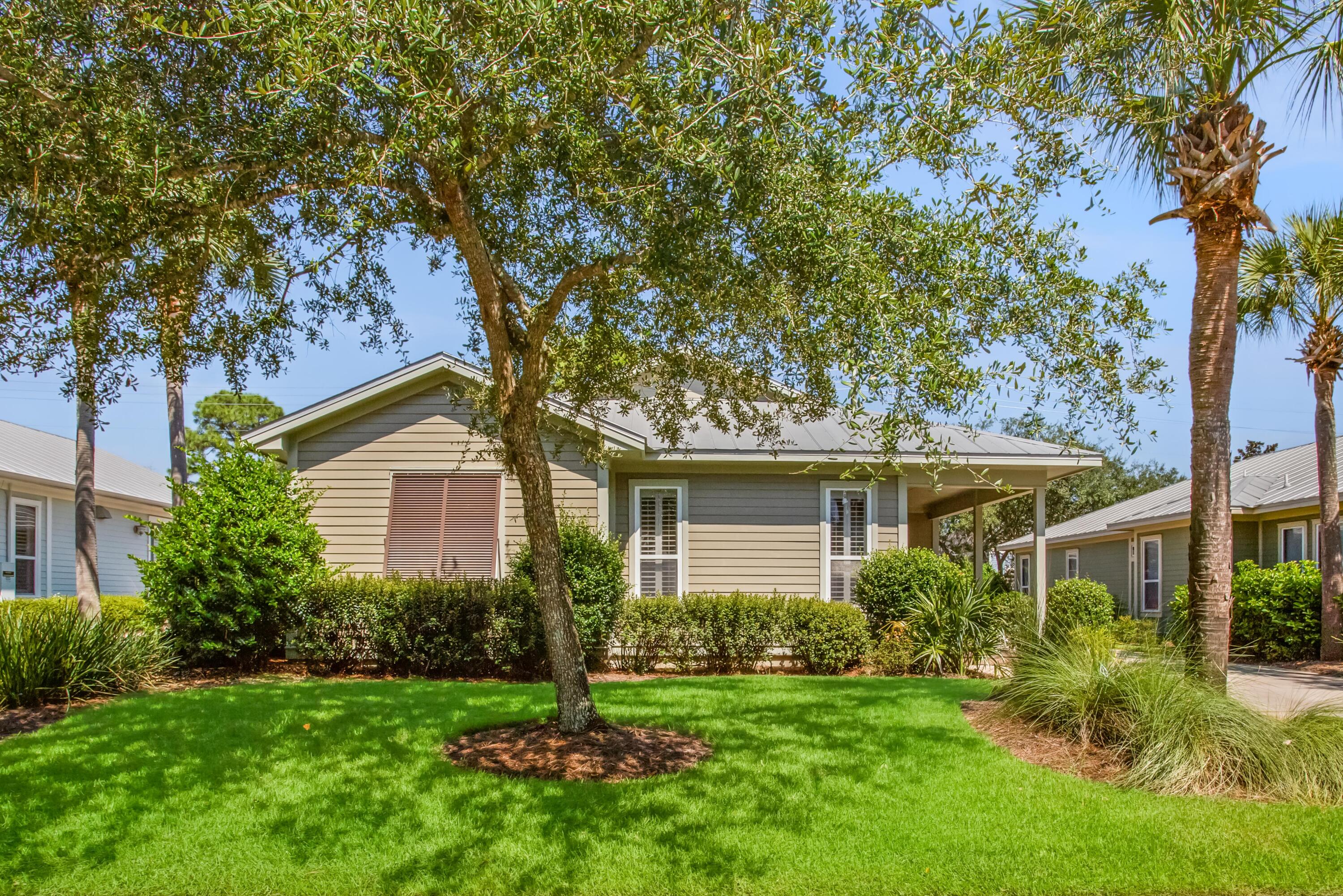 Looking for a single-family residence with a garage in the heart of Sandestin Golf and Beach Resort, then look no further! This 1-story home, built by Huff Homes and  located in the ever popular neighborhood of Crystal Lake, has never been rented and has been meticulously kept and well maintained by its only Owner. The living area is open and spacious with ample windows, allowing for lots of sunlight.  Two sets of French doors open to the screened porch which invites outdoor living and a perfect spot to relax after a long day at the beach.  The split floor plan allows the primary suite and guest suites their own privacy. The large primary suite has a private access to the screened porch, dual walk-in closets, walk-in shower, and a linen closet in the bath.  One of the additional