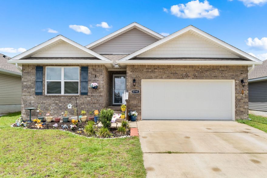 1% CREDIT TOWARDS CLOSING COSTS AND/OR RATE BUY DOWN WITH PREFERRED LENDER!  Welcome to this well maintained 4-bedroom, 2-bathroom home offering just over 2,000 sq ft of comfortable living space! Step inside to an open-concept layout that seamlessly connects the kitchen, dining, and living areas--perfect for entertaining. The kitchen is a true centerpiece, featuring a large island with seating, granite countertops, a spacious pantry, and a new stainless steel dishwasher and french door refrigerator. The generously sized primary suite offers a peaceful retreat with a large walk-in closet, double vanities, and a stand-up shower in the ensuite bathroom. Every bedroom also includes ceiling fans for added comfort. The other three spacious bedrooms are located towards the front of the home and share a full bathroom with a upgraded vanity with a quartz top. Another one of the great aspects of this home is it's laundry room with plenty of space for storage and comes equipped with with a high efficiency washer and dryer. Enjoy the outdoors year-round from the stunning 230 sqft screened-in back porchideal for relaxing or hosting guests. The attached two car garage is a dream for storage, complete with heavy-duty shelving and built-in storage solutions. The exterior of the home also features LeafFilter gutters to help prevent those Florida afternoon summer showers from puddling up around the home. This home combines functionality, style, and spaceschedule your showing today!
