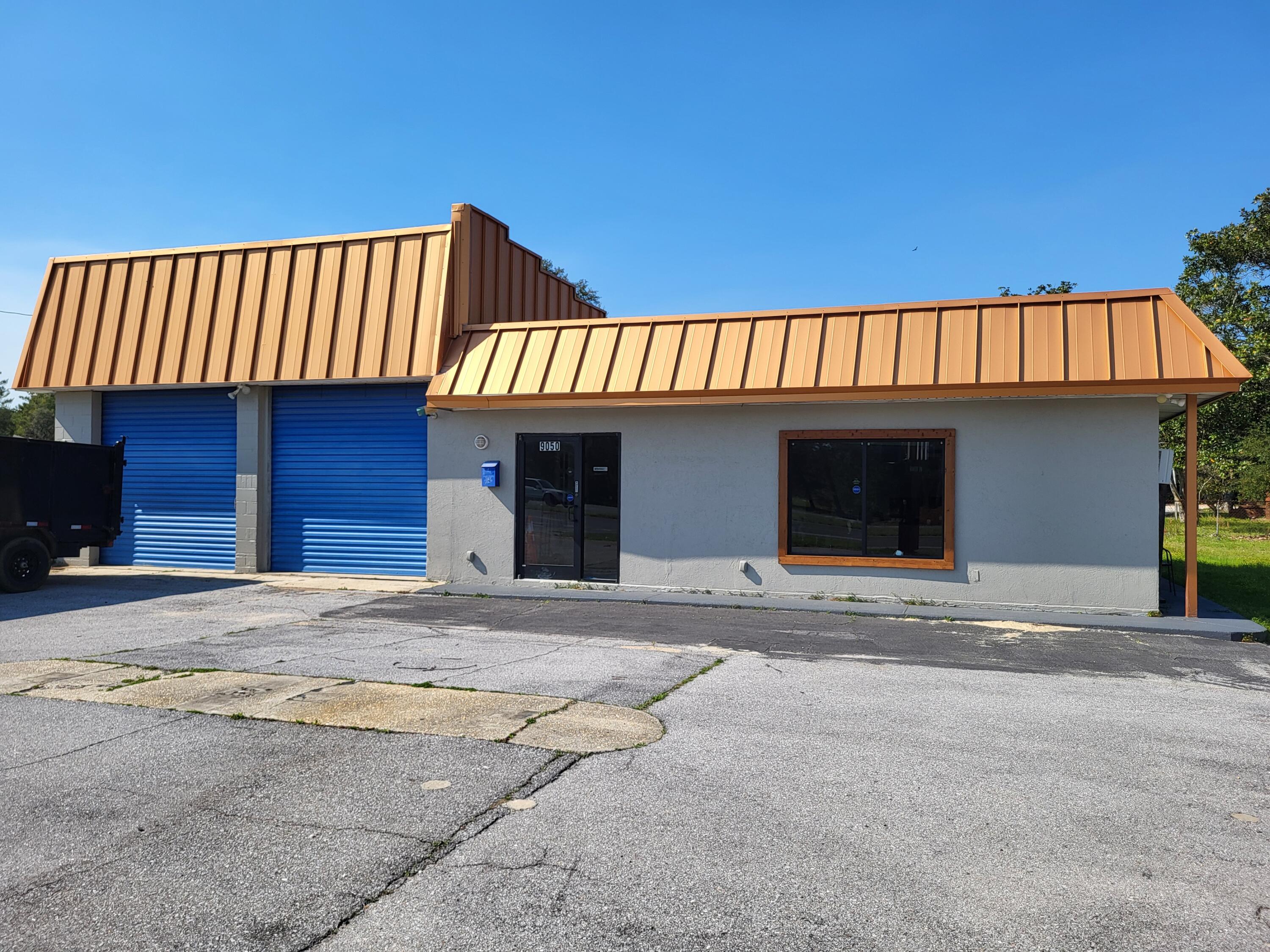 Building has office area, 2 bay warehouse area with 2 garage doors, storage area in rear of building, paved parking, free standing metal sign, existing median cross over in front of property. Building is approx 1,700 sqft block building. Owner will be installing a new AC unit in office area. Lease is NNN.