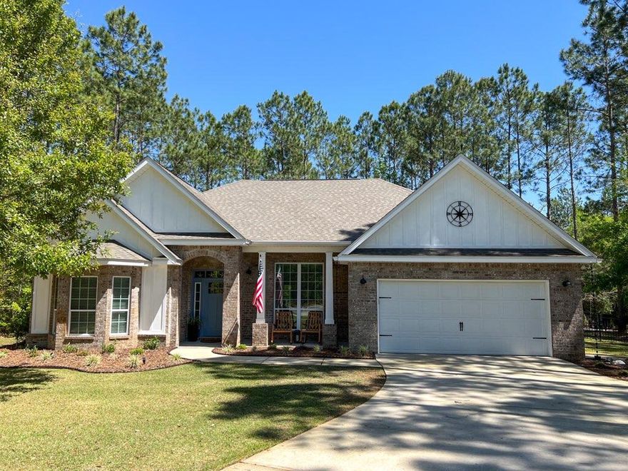 Looking for a beautiful home on a ''one of a kind'' oversized lot in Hammock Bay?? Then this home is just what you're looking for!! This beautiful home with 3 bedrooms, 2 baths plus a spacious flex/office room is tucked away in a culdesac on a beautiful large lot and backs up to a wooded area with a small creek. So many extras with this home! Fenced-in back yard, security system, RING doorbell, larger trim package, updated light fixtures, extended porch, flood lighting, landscape lighting, custom built fire pit, custom built tree house with bed swing, 8x12 shed, shiplap accent walls in the living, dining, and Master bedroom, Bamboo flooring throughout the home, new fireplace and facing in the living room, new backsplash in kitchen, built-in bookcase in living room, plus many more extras!