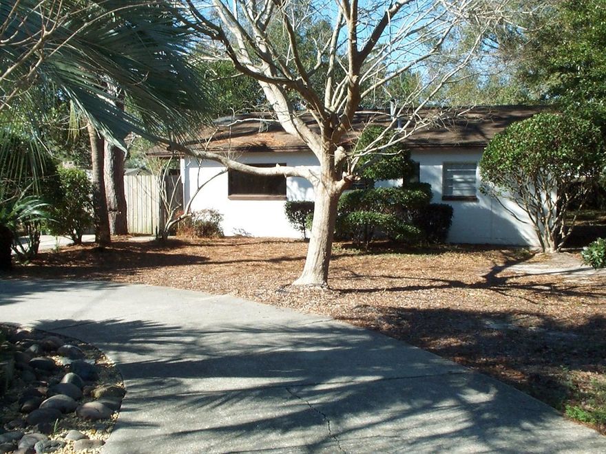 RENOVATED.. NEW Flooring, NEW interior painting, NEW interior doors, NEWER HVAC, NEW bathrooms. You'll love this cute home inside and out. Circular driveway and lovely landscape is the front focal point. Interior is all spruced up and ready to move in - it's like a new home inside. Area between the home and the back yard is separately privacy fenced and ideal as an outdoor entertainment area. There is also an exterior door that leads into the laundry room from this lovely outside area. ... This home being offered ''As Is'' .. Check out the on-line photos. ...