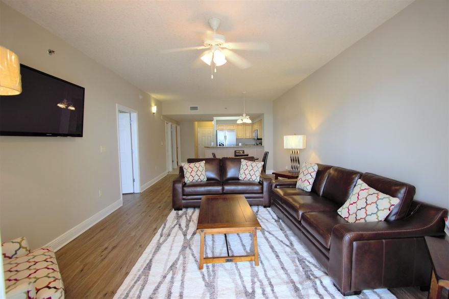 Great Views from this beautifully furnished 2 bedroom  2bath condo located in the center of the building. Awesome views of the beach and coastline! This condo features 9 foot ceilings  a new kitchen with granite countertops, maple wood cabinets and new stainless appliances.  Condo has brand new furniture throughout with all new mattresses and accessories. New vinyl wood flooring installed in bedrooms and living room area. Enjoy the two large pools as well as convenient access to over 2,000 feet of white sugar sand beaches. Ariel Dunes is located in Seascape Golf Resort offering amenities such as golf, tennis, and pools. Want a quick bite- just go downstairs to Cabana Cafe.  Enjoy a beach resort lifestyle just minutes away from designer factory outlets and fishing. Great Investment!
