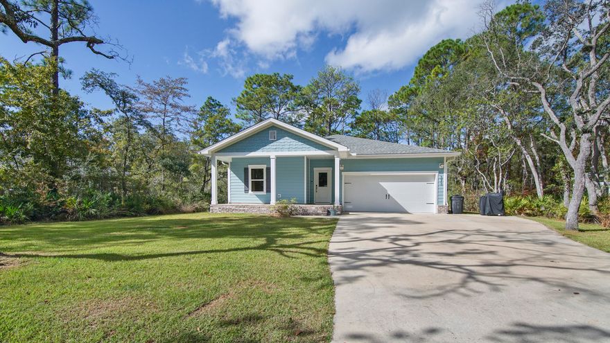 MOTIVATED SELLERS! Are you in search of a newer home with no HOA fees and a generous 1/2 acre lot? Look no further! This charming 4-bedroom Florida cottage built by Grahame Homes, nestled in Cross Creek Shores, is move-in ready for its lucky new owner. Constructed in 2020, this delightful split-floorplan home provides ample space for a growing family all on a single level.  Featuring luxurious LVP flooring throughout, attractive countertops in both the kitchen and bathrooms, a spacious dining area, and a generously sized family room, this home boasts a host of fantastic amenities. The master suite is roomy and includes its own en suite and walk in closet, while the children's bedrooms are adorned with tastefully accented walls.