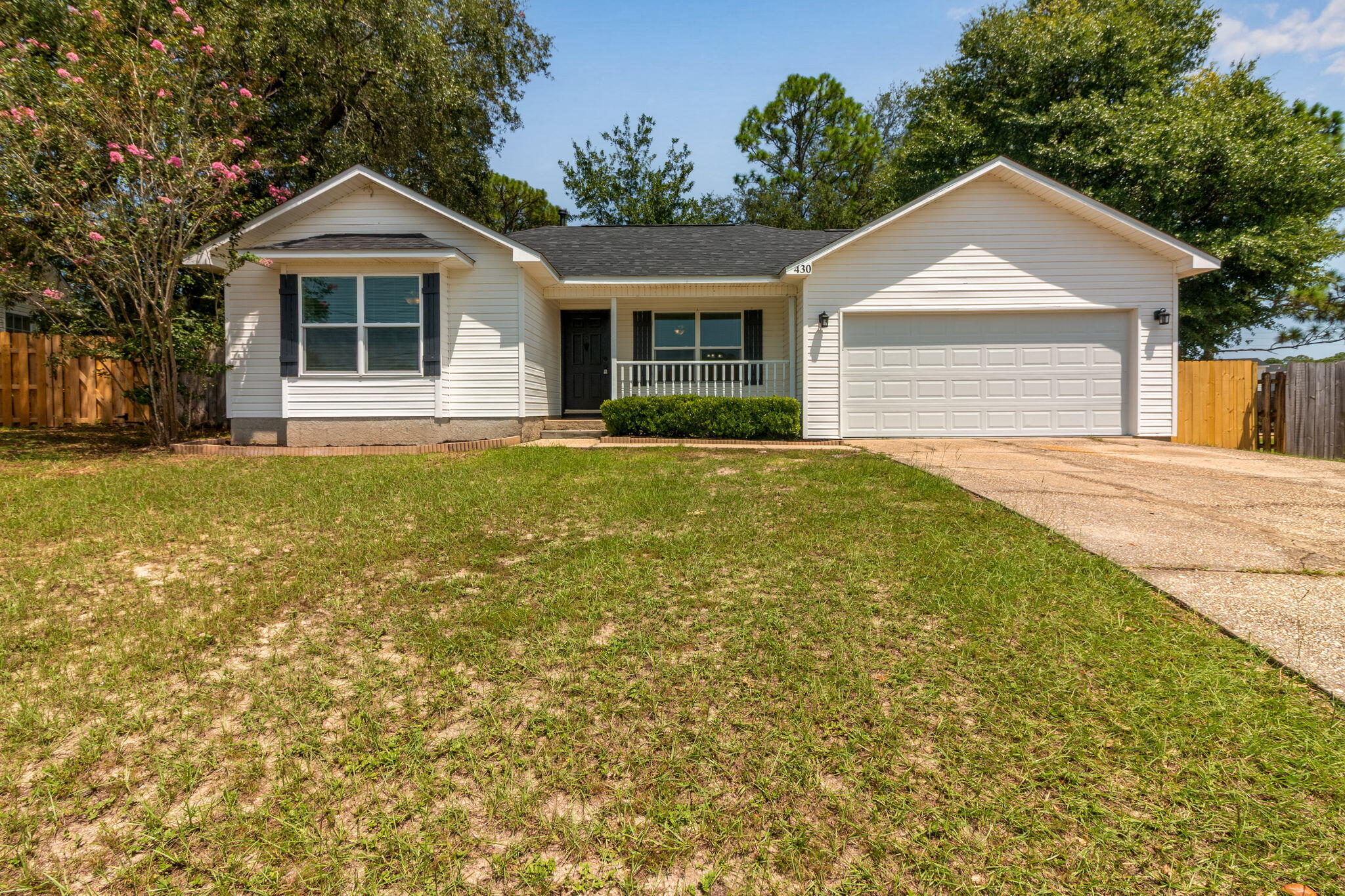 Located in the desirable South Crestview area, this beautifully updated traditional-style home offers both convenience and charm. Close to local bases, shopping, and restaurants, you'll enjoy easy access to everything you need.Step inside to a bright and airy interior filled with natural light. The kitchen features updated countertops, modern cabinets, and a stylish tile backsplash. Bathrooms have been refreshed with new cabinets, granite countertops, and unique tile flooring. Throughout the home, LVP flooring provides durability and a seamless flow.Relax in the shade of the covered back porch, perfect for enjoying quiet mornings or evening gatherings. This move-in ready home blends timeless style with modern updates for comfortable living.