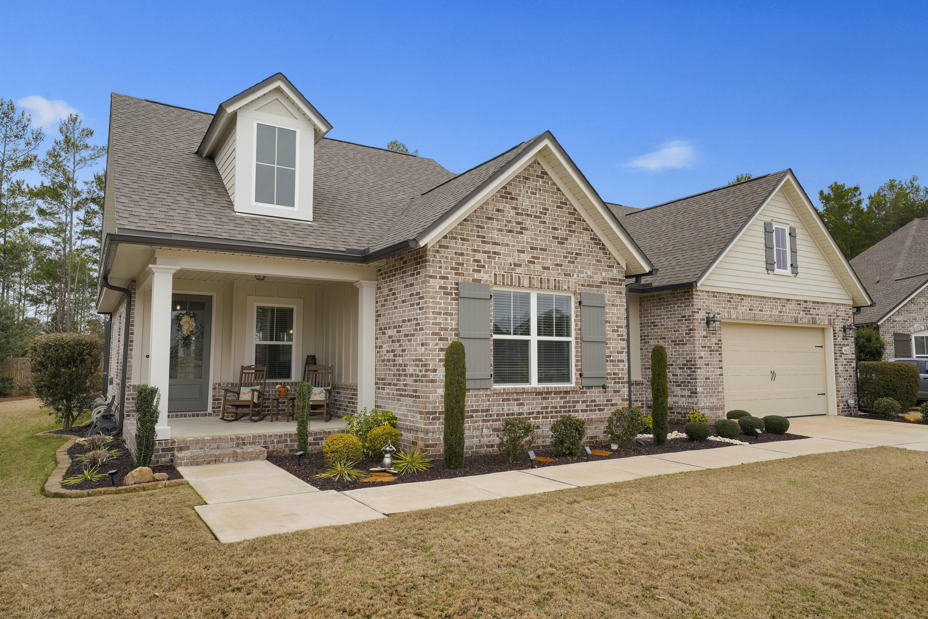 Come enjoy this beautifully crafted 2056 sqft Randy Wise built home. Upon entering you are greeted with an open floor plan. This includes a formal dining room expanding into your living room and kitchen overlooking the outdoor pool with paver decking and screen enclosure. This state of the art kitchen has an oversized island, stainless steel appliances, walk-in pantry and is inviting for any party. The master bedroom comes with a spacious dual vanity, walk-in closet, garden tub and shower. The two remaining bedrooms share a bathroom and both have a walk-in closet.This home features an irrigation system, all laminate and tile flooring, two-car garage, a gutter system, and a fully fenced in backyard. Make yourself at home in Hammock Bay!