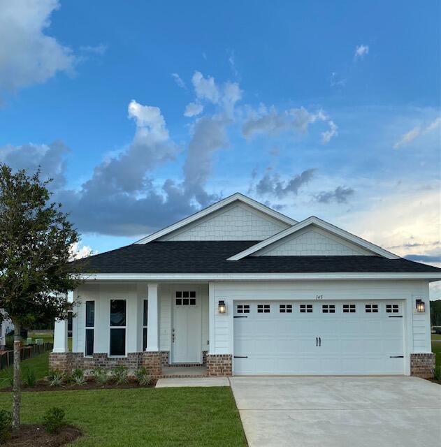 Builder pays most closing costs when a preferred lender is used. In addition, this home is eligible for a fixed loan rate of 3.99% for FHA or VA buyers, plus up to $10K flex money. CONV buyers get $25K flex money which can be used for a rate buydown, builder options or other closing costs.THE BLUFFS is a new Freeport subdivision located just a 20 minute drive to South Walton beaches! This home is built in the Craftsman style, 3 BR/2 BA home with Hardiboard siding and brick skirt. The interior features 9' ceilings throughout, and 10' trey ceilings in the Living Room and Master Bedroom. 8' entry doors, quartz countertops and durable CoreTec Pro Plus luxury vinyl plank flooring in main living areas, carpet in bedrooms. Large walk-in master closet.