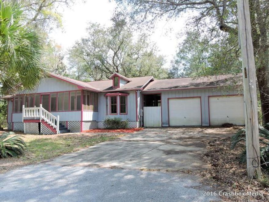 Home in North Santa Rosa Beach on double lot. This home is a Fantastic chance to own in an area that is on the move. This home is situated on a large wooded lot with privacy and close to many points of interest including The Beaches Of South Walton. Call today for your private viewing !