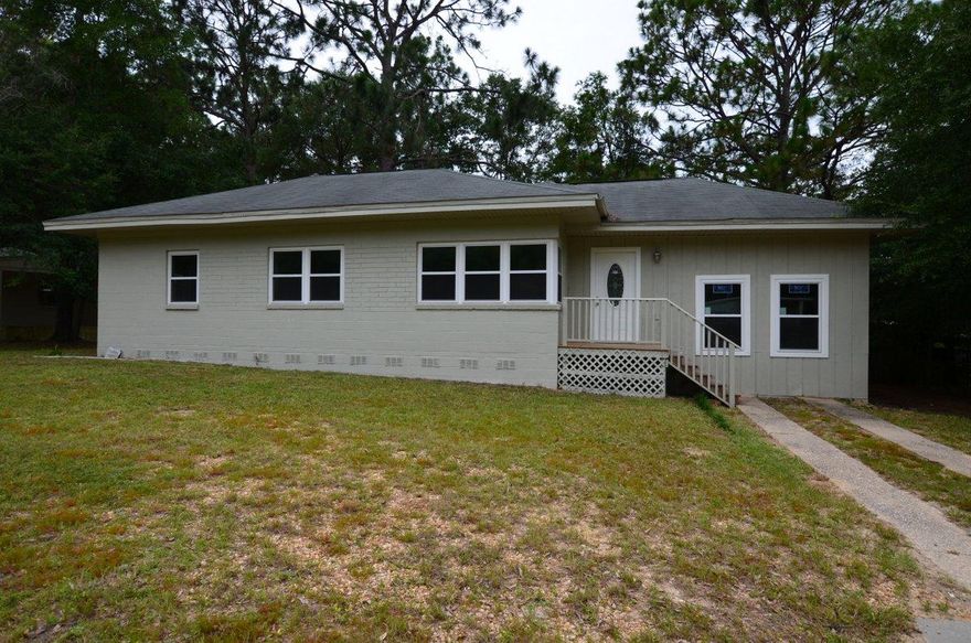 Close to town. Affordable. Move in ready! This home is cute as a button. Property has had many new upgrades and still has plenty of future potential. Home has new roof, new hvac, new fixtures, cabinets, tops, windows, and appliances. A 3 bedroom 1 and 1/2 bath home and originally built in 1955, this concrete block home is a must see for this price range! Hardwood floors, tile, a must see to appreciate. Call today!