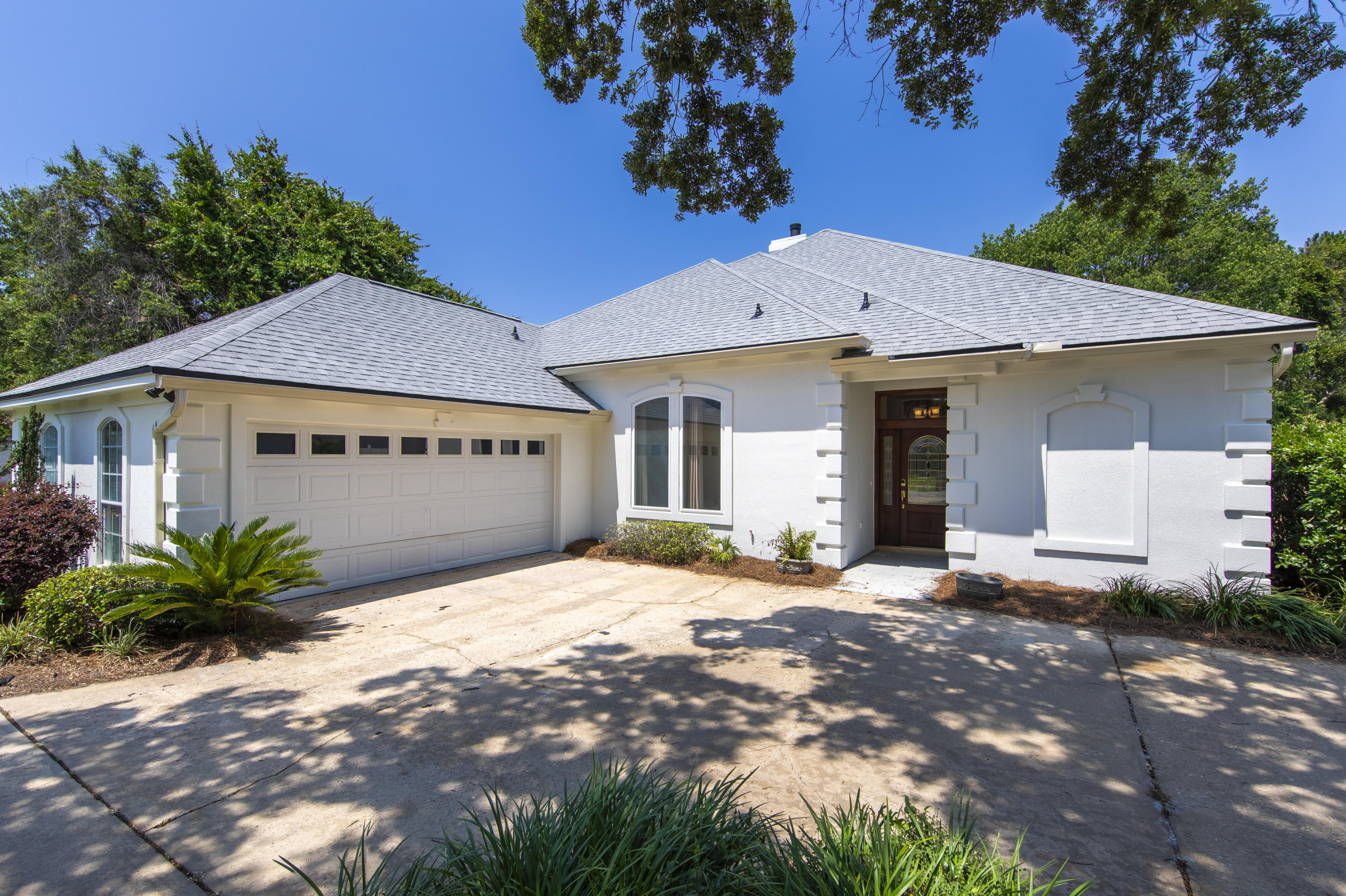You must see this newly updated home for sale in Destin's coveted Indian Bayou neighborhood. This large four-bedroom, three-bathroom home has plenty of living space for the whole family. Recently remodeled inside and out, you will find upgrades including a new A/C unit in 2020 along with fresh exterior paint and a new roof installed in 2021. The kitchen features custom cabinetry, stainless steel appliances, granite countertops, and custom backsplashes. The main living room has been pre-wired for a state-of-the-art entertainment system and also comes with a stone fireplace, wet bar, and wine fridge. Just minutes from the beach, shopping, grocery stores, and the new Destin High School, this home won't be on the market for long! Schedule your showing today.