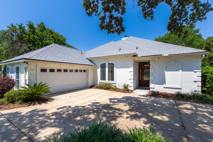 You must see this newly updated home for sale in Destin's coveted Indian Bayou neighborhood. This large four-bedroom, three-bathroom home has plenty of living space for the whole family. Recently remodeled inside and out, you will find upgrades including a new A/C unit in 2020 along with fresh exterior paint and a new roof installed in 2021. The kitchen features custom cabinetry, stainless steel appliances, granite countertops, and custom backsplashes. The main living room has been pre-wired for a state-of-the-art entertainment system and also comes with a stone fireplace, wet bar, and wine fridge. Just minutes from the beach, shopping, grocery stores, and the new Destin High School, this home won't be on the market for long! Schedule your showing today.