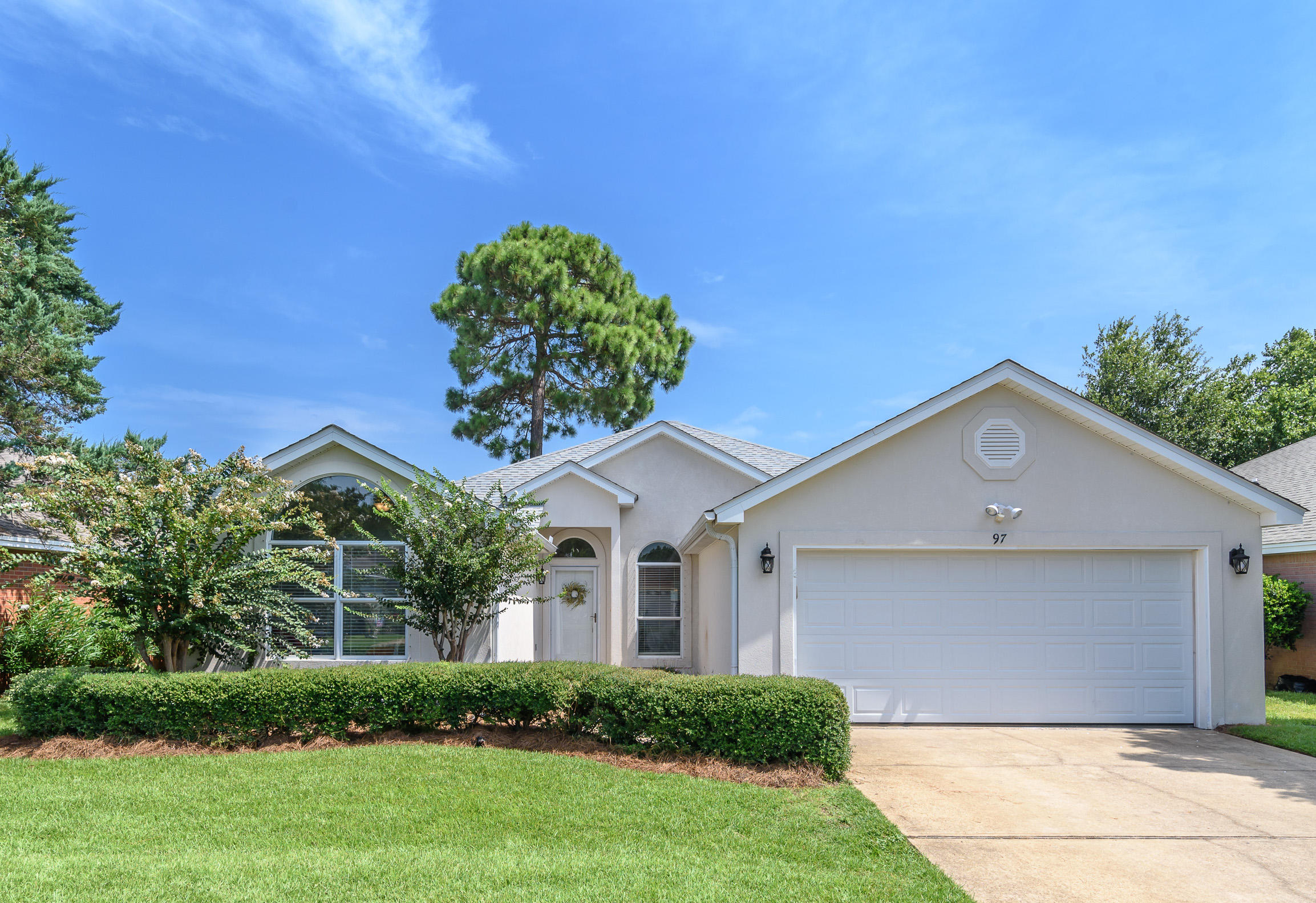 Charming 3 Bedroom/2 Bath house in Bayside Subdivision in Miramar Beach. Great for a vacation home, or full-time residence! This split floor plan home with vaulted ceilings and recessed lighting has brand-new Stainless appliances, beautiful new quartz countertops, all new lighting-including the outside entry lights. There is fresh neutral paint throughout, and brand new flooring in the bedrooms, complementing the tile in the rest of the home. The master suite has 2 large walk-in closets, with double vanity in the bath and separate garden tub & shower. The other roomy bedrooms share a bath. Also notable features included are, a large florida room, laundry room, 2-car garage, hurricane shutters and location.