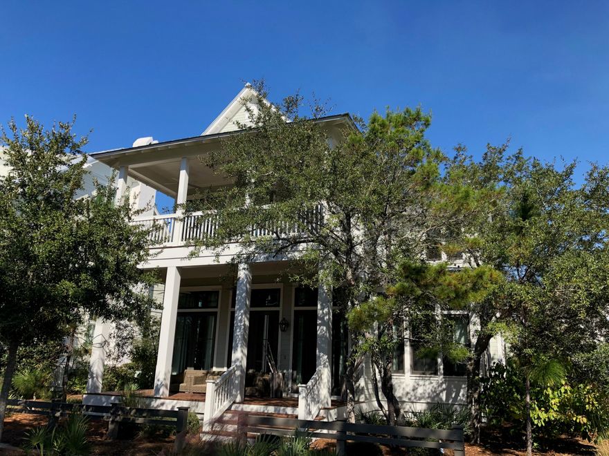 Custom Built Romair home in Phase III of Watercolor. This 5 bedroom, 5 Bathroom home with bunks on a corner lot with 2 car garage and carriage house. Outdoor kitchen with fireplace. Home has never been on rental.