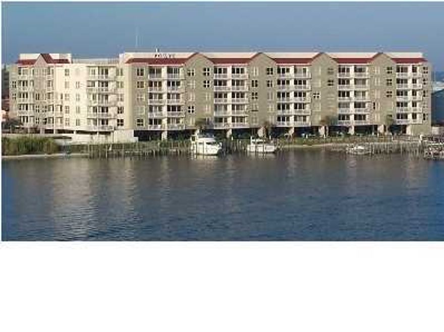 Owner will look at any reasonable offer - bring us one! Corner unit with a lockout - one side is a studio with full kitchen, bath and washer/dryer. Other side is a two bedroom two full bath. Rent one side keep the other for yourself or rent both sides. 50 boat slip, waterfront with great views. This unit has possibilities to be remodeled into one beautiful unit as the unit below has been.