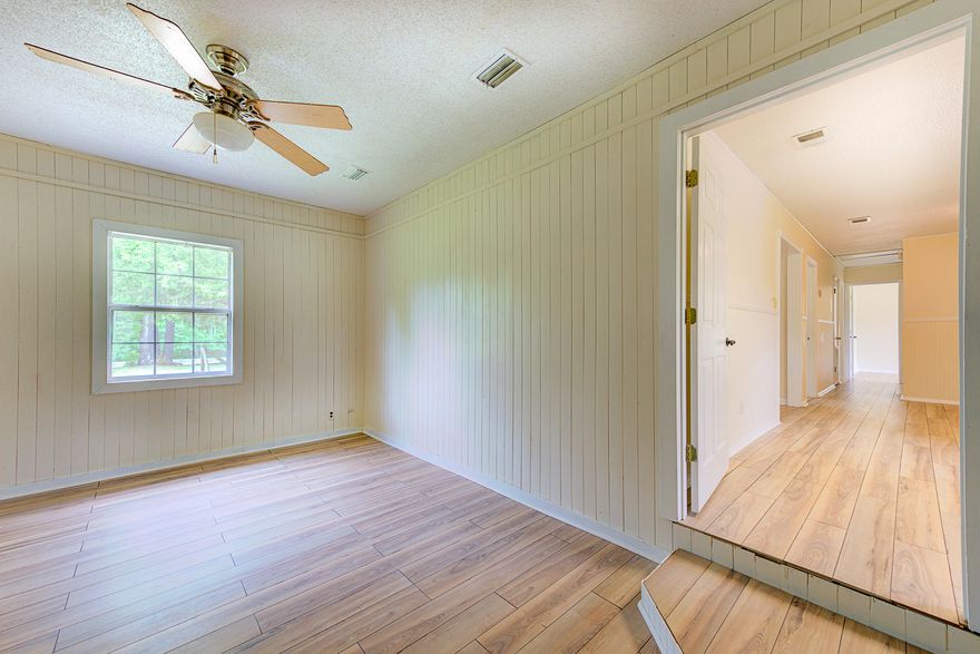 Beautiful  4 Bedroom 2 bath brick home on 5 acres cleared!! Home has been upgraded with waterproof laminate floors through out.  New Formica counter tops in the kitchen.  Double pane windows.  Has a nice open deck in the back and an open porch in the front. Large workshop 36x24.  About an hour from the beautiful white sand beaches of Destin. Several lakes, campgrounds and recreational areas locally.