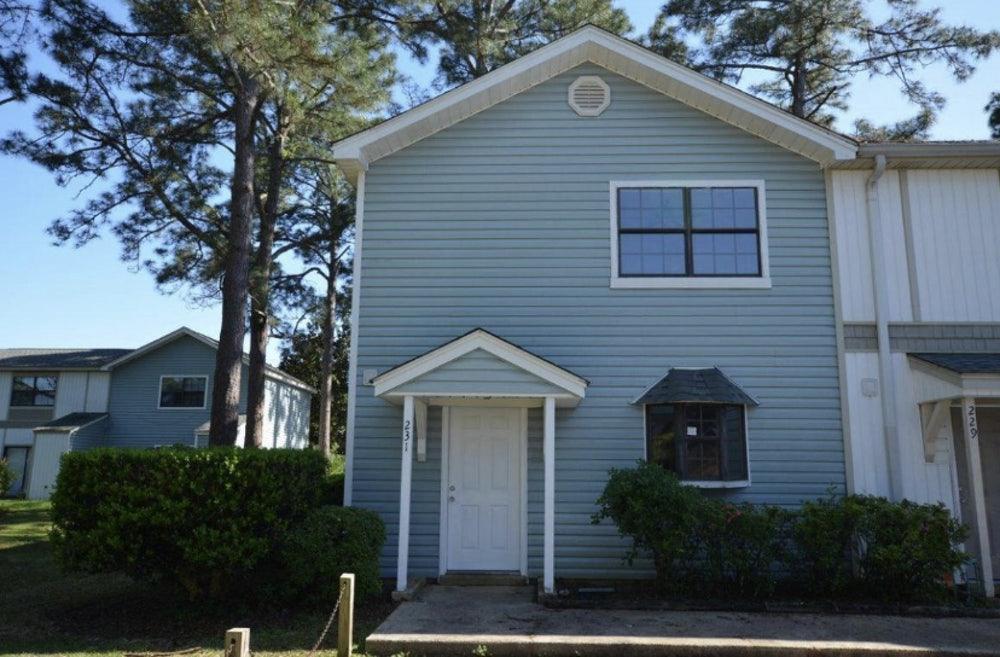 This updated townhouse is MOVE IN READY! Downstairs features an updated kitchen with stainless steel appliances, washer and dryer hook up, half bath and a living area. Upstairs you find the 2 bedrooms and full bathroom. New laminate, tile and carpet flooring was installed in 2018. Located close to shopping, restaurants, beaches and military bases, this property is great for owner occupants or investors alike!
