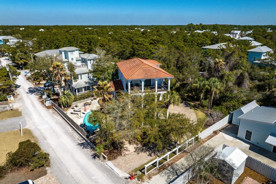 OVER 1/4 acre south of 30A just yards to the beach! Ill bet you didn't think that was possible at this price. SPECTACULARLY renovated 30A retreat. Located only 300 yards north of the beach and South of 30A on .28 acres of lushly landscaped yard, it is a true oasis. The landscaping features Azaleas, Carolina Jasmine, Fig Trees and even your very own Meyer Lemon tree for a fresh touch to your beach drinks! The heated private pool and outdoor kitchen host even the largest crowd. On the first floor is a bedroom with private bath and a bunk room with play area for the children. Come up to the second floor living area and find a completely new kitchen, living room and bedroom with bath. A full length balcony adds to the space on the main floor. The 3rd floor features 2 bedroom suites each with private bath. Master with soaking tub and separate shower along with double vanity. Full length balcony adds to the experience of the master and offers a peek a boo view to the gulf.  The home conveys fully furnished and ready to be used as a primary residence, second home or investment property. 95% of the furniture is completely new. Additionally, Eastern Lake is a short walk away and offers fishing, swimming paddle boarding and canoeing. There is also a shallow area for children's swimming.

Come and see this exceptional home and make it your own.