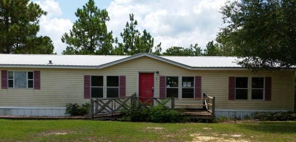 Real Estate Owned REO. Super Buy! Super Size! On this waterfront manufactured home with 3 bedroom and 2 baths. 1960 square feet of living space. Bring your fishing pole and enjoy this waterfront property.