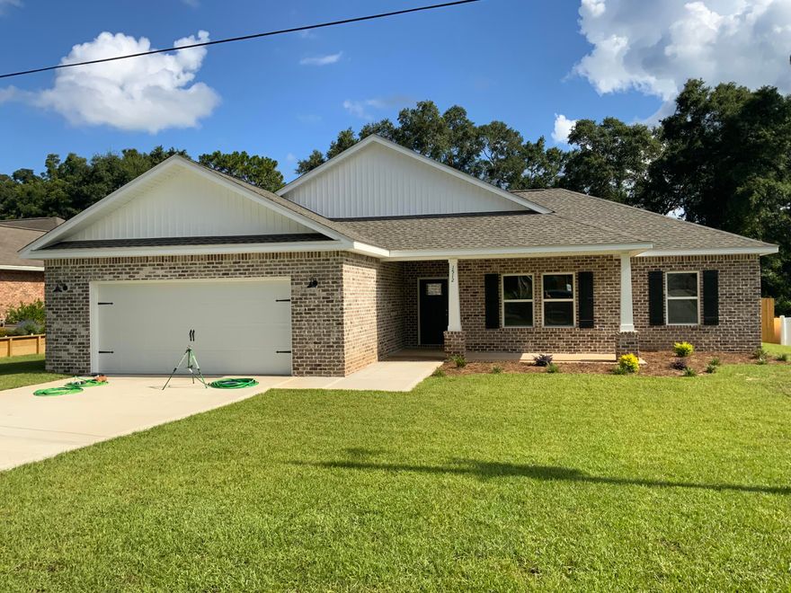 PREFERRED BUILDER PAYS ALMOST ALL THE ALLOWABLE CLOSING COSTS FOR VA HOMEBUYERS!! Quiet/no-traffic/established/down right neighborly cul-de-sac street,just 1 block from Baker School (K-12)... EARLY JULY COMPLETION, all brick w/Craftsman touches,covered back porch,privacy fenced backyard because who doesn't want a privacy fenced backyard?? ... super functional/practical/proven 4BR plan has 3 separate BR zones (study/office option) ... classic 'seat & eat' ISLAND BAR KT+breakfast room,shaker style cabs,soft close doors & drawers,quartz counters,corner pantry ... MBR has tiled walk-in shower,double vanities,walk-in closet ... Lg laundry+mud room ... Baker is the easy backroad+bypass commute to EglinAFB & all points south (avoid the Crestview traffic) ... PHOTOS of exact plan previously built