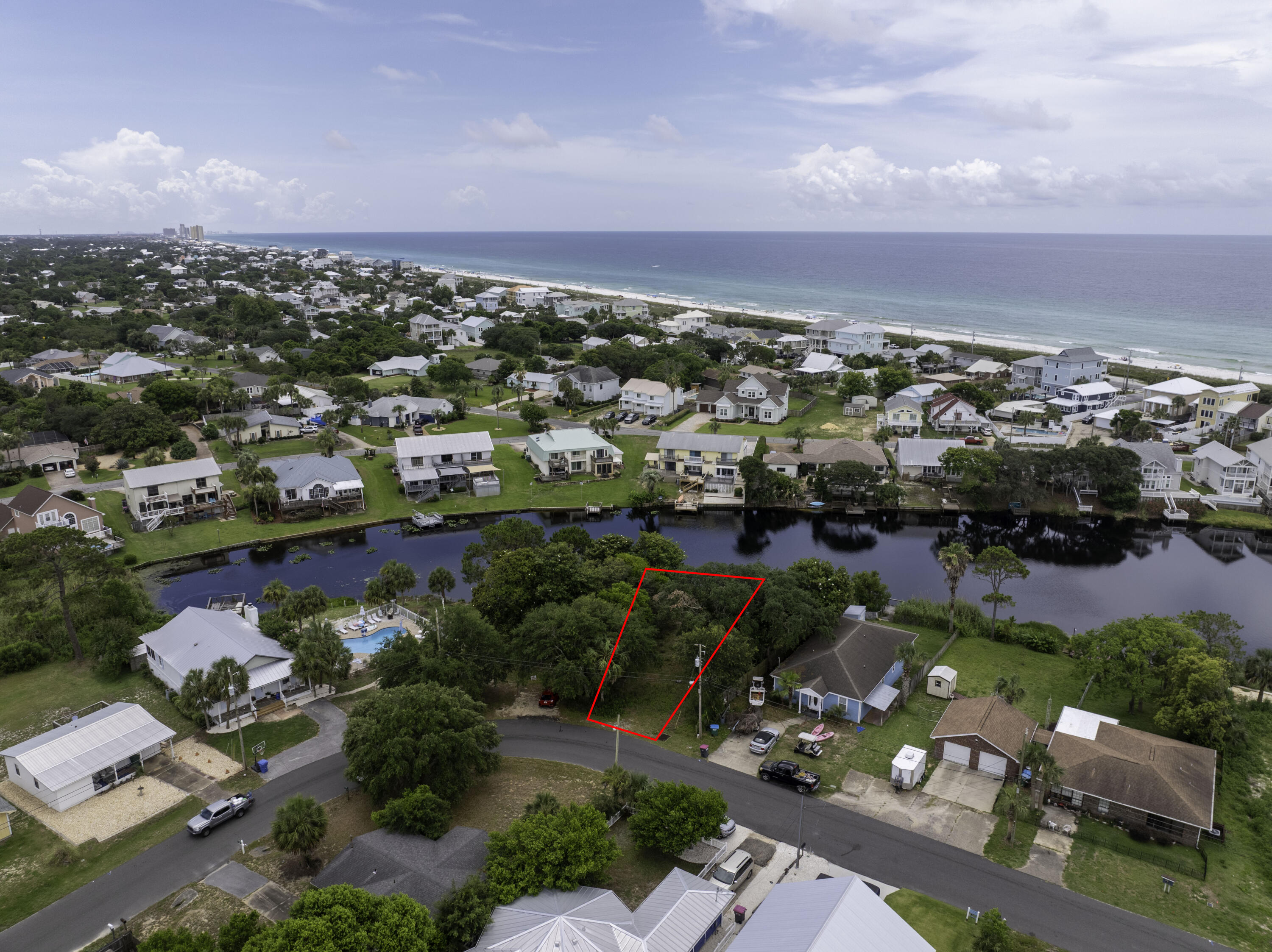 Build Your Dream Home by the Water!Welcome to 324 Le Grand Dr, a beautiful lakefront lot ideally located on the highly desirable West End of Panama City Beach. Just a short walk to Beach Access #86, this prime homesite offers the best of both worlds--tranquil lake views and easy beach access.This lot features a new sewer line to the front of the property, with water and sewer connections available, saving you time and expense during construction. The spacious lot provides plenty of room to add your custom-built pool or create the outdoor oasis you've been dreaming of.Location Highlights:Quiet, residential streetMinutes to 30A, Pier Park, dining, and shoppingNo HOA