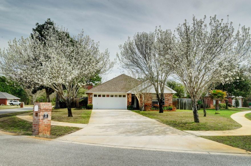 Beautiful remodeled Destin home located in wonderful subdivision of Hidden Pines which has sidewalks and underground utilities. This home has 3 bright bedrooms, 2 bathrooms and a two car garage. $60k+ remodel includes kitchen with stainless steel appliances, extra tall, soft-close, full extension, white painted maple cabinets and granite counter tops. Both of the bathrooms have updated toilets and maple cabinets with granite. No ugly popcorn ceilings! Lots of upgrades including gas/wood burning fireplace with gas logs included, tile floors, new lighting in entire home, crown molding, custom bamboo blinds, pre-wired for surround sound and even includes a whole house central-vac system (ports are hidden in closets). The house feels very open and spacious due to high vaulted ceilings. Master