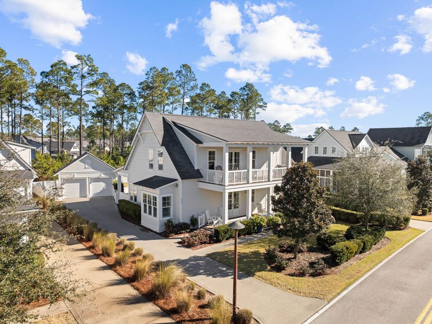 Set against a backdrop of golf course views and serene green space, this beautifully crafted four-bedroom, four-bathroom home in the coveted Watersound Origins community offers a perfect combination of luxury and privacy. Designed by Romair Construction, the residence features a large, private lot with a saltwater pool, a detached two-car garage and an expansive driveway. This property offers the rare feeling of seclusion while being just moments from the vibrant amenities of the neighborhood.  Inside, the home radiates sophistication with plantation shutters, hardwood flooring, and a spacious layout that seamlessly connects the living, dining and kitchen areas.