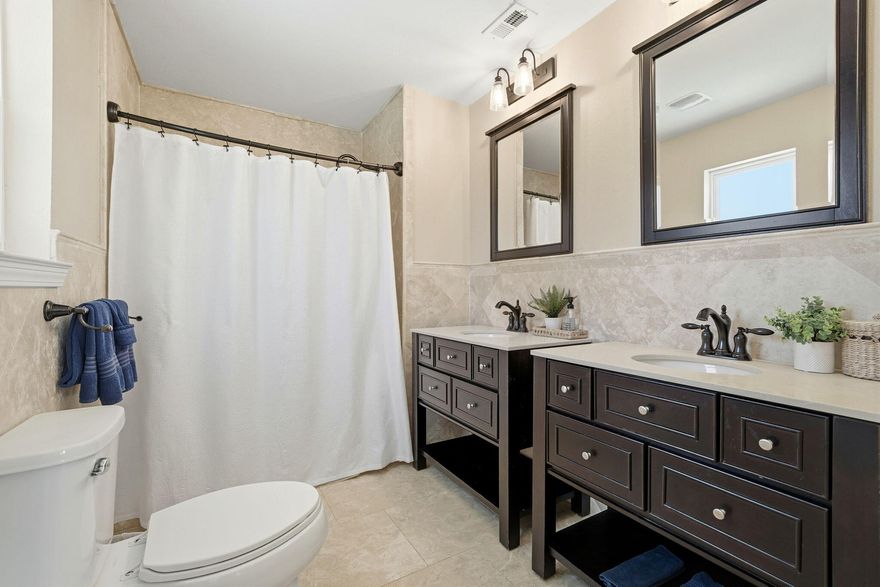 Welcome to a beautifully maintained corner-lot home that blends space, function, and location--just 10 minutes from the beach and close to everything town has to offer.Set on a huge half-acre lot, this property is not in a flood zone, has no HOA, and offers the freedom and flexibility today's buyers are searching for. The exterior features a durable metal roof, vinyl siding with brick accents, full fencing, and a double gate for easy access to the backyard--perfect for boats, trailers, or future projects. Inside, you'll appreciate the open floor plan and the comfort of no carpet throughout. The kitchen is designed for both everyday living and entertaining, featuring soft-closing cabinets, an abundance of storage, a central island with a flat-top GE stove, Whirlpool refrigerator, and Frigidaire dishwasherall thoughtfully laid out for convenience and flow.

The primary suite offers a large, spacious walk-in closet complete with custom built-ins (no wire shelving) and direct access to the deep laundry room, which includes front-loaders and extensive cabinetryfunctionality at its finest. Bedrooms are located on the same side of the home, creating a traditional layout ideal for families.

A unique architectural touch leads you down into the living area/loft with a soft, comfortable step-down flooring, adding character and warmth to the space. Accordion-style semi-transparent blinds provide natural light while maintaining privacy.

Outside is where this property truly shines. With two rear exits, extra concrete, and easy side-yard access, the backyard is already prepped for a brand-new pooland a pool company can access the yard with ease. There's also an oversized, tall metal barn cover ideal for an RV, boat, or recreational toys.

Additional highlights include a single-car garage, water heater and clean, clearly labeled breaker panel in the garage, minimal guttering, and busy-road access that offers convenience to nearby amenities.

Currently used and meticulously cared for as an Airbnb, this home is move-in ready and equally well-suited for a primary residence or investment opportunity.

Space, freedom, and locationthis one checks boxes that are hard to find.