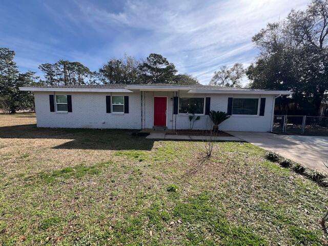 This lovely 4/2 Home with Large Laundry/Bonus room and WIDE Driveway is on a fenced .35 Acre corner lot in the heart of Fort Walton Beach! Walk to Home Depot! The Living room is nearly 28' long. The Eat-Kitchen is open with a Breakfast bar, Wood cabinets and newer Formica counter-tops. All 4 Bedrooms have ample closet space and there are additional storage closets at the entry and in the hallway. This home has been completely updated to include: Rewire to Copper/New plugs and switches, Vinyl Windows, Wood Look Tile in the Living room/hallway, Tile throughout, Tiled Master Shower, Tile surround/tub in Guest Bath, Updated Appliances and New Light Fixtures. HVAC, windows and Hot Water heater were all new in 2022! Roof was new in 2021 The Yard is fenced and has a quality built shed.