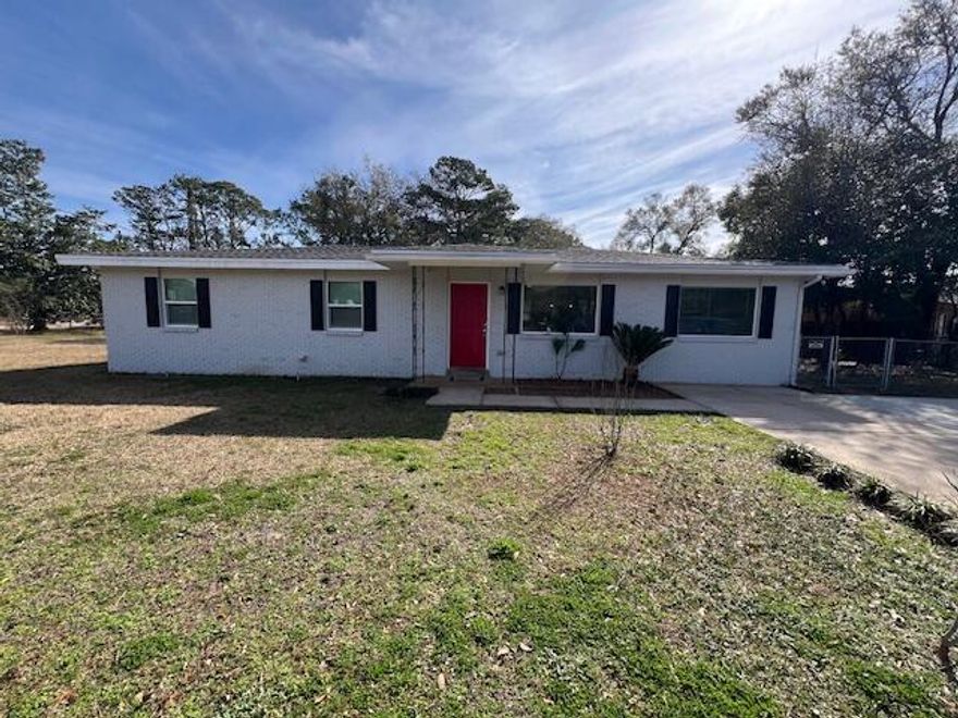 This lovely 4/2 Home with Large Laundry/Bonus room and WIDE Driveway is on a fenced .35 Acre corner lot in the heart of Fort Walton Beach! Walk to Home Depot!  The Living room is nearly 28' long.  The Eat-Kitchen is open with a Breakfast bar, Wood cabinets and newer Formica counter-tops. All 4 Bedrooms have ample closet space and there are additional storage closets at the entry and in the hallway.  This home has been completely updated to include: Rewire to Copper/New plugs and switches, Vinyl Windows, Wood Look Tile in the Living room/hallway, Tile throughout, Tiled Master Shower, Tile surround/tub in Guest Bath, Updated Appliances and New Light Fixtures. HVAC, windows and Hot Water heater were all new in 2022!  Roof was new in 2021 The Yard is fenced and has a quality built shed.