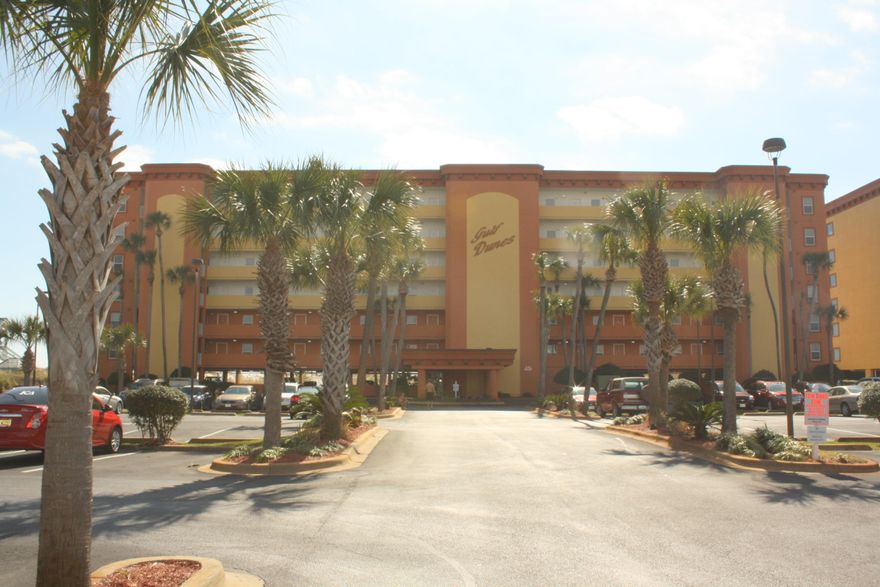 Here's your opportunity to own a Gulf front condo in Gulf Dunes on Okaloosa Island! Great Gulf views from this 2BD/2BA+bunkroom that's actually on second floor unit as the first level is covered parking. Beautifully decorated with a tropical flair, this unit is move-in ready, whether for your own personal vacation getaway, second home or investment property with excellent income potential. Pride of ownership shows, it's in pristine condition! Tile floors in the living areas and wet areas, with upgraded carpet in the bedrooms and bunkroom. Laundry room with washer and dryer in unit. Large breakfast bar, waterfront master suite, large balcony accessible from master and living area. Amenities include gym, grilling area. Great location close to restaurants, shopping and attractions!