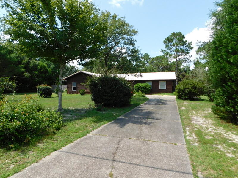 1.03 acres of level land & landscaped! Bring your RV, boat, tools and build a workshop. This ranch style home has been completely gone through on the inside. There is a new kitchen with Granite countertops, soft close shaker style cabinets, wood laminate floors, stainless steel appliances and plenty of natural light. There is a brick, wood burning fireplace, spacious inside laundry room. The large family room has a bay window and a beautiful view looking out to the oversized back yard that is backed u to the woods for privacy. Inside has fresh paint T/O, chair rails, brush nickel hardware and vinyl windows. There is a low maintenance metal roof , fenced back yard and located on a culdesac street for peace and quiet. Take a look before it's gone !