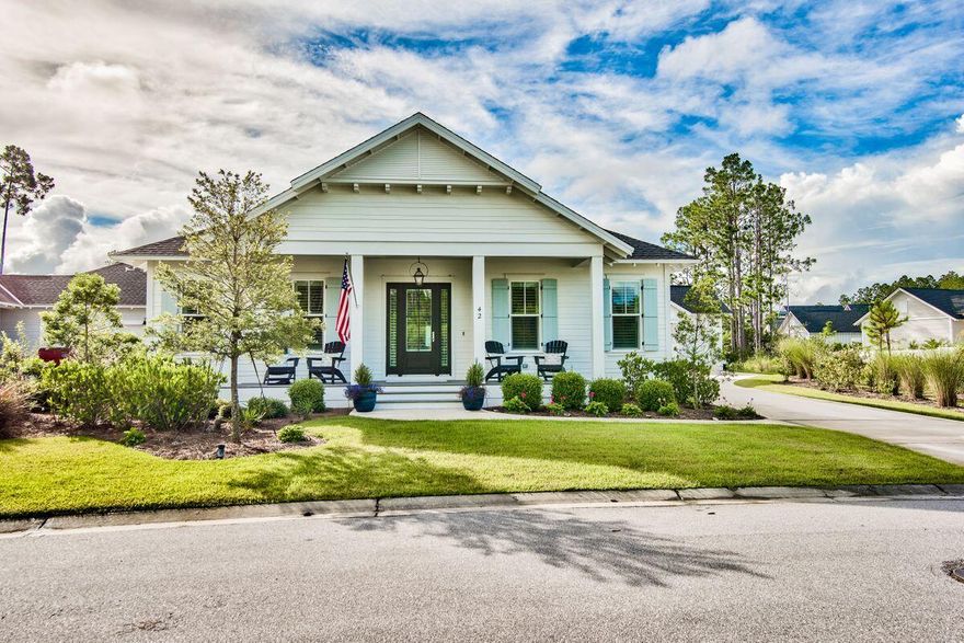 Lovely home built less than two years ago; owner (interior designer) cannot close until mid-November to take advantage of tax benefit.  Popular Ficus floor plan, 4 bed, 3.5 bath, with a 2 Car & golf cart garage on a very private large homesite looking out on a quiet wooded green space across street. This home features Quartz counter tops throughout, wallpaper, Medallion hardwood flooring in living area, Lap and Gap from hallway to kitchen and in master bedroom, vintage gray tile in laundry and 2nd and 3rd bath, 10'ceilings, under cabinet lighting in kitchen, upgraded Wolf appliances including 24'' microwave drawer, dual fuel 30'' range, sub zero appliances, gas stub out with a poured pad for your BBQ grill just out side your screened porch. The garage has additional insulation in ceiling