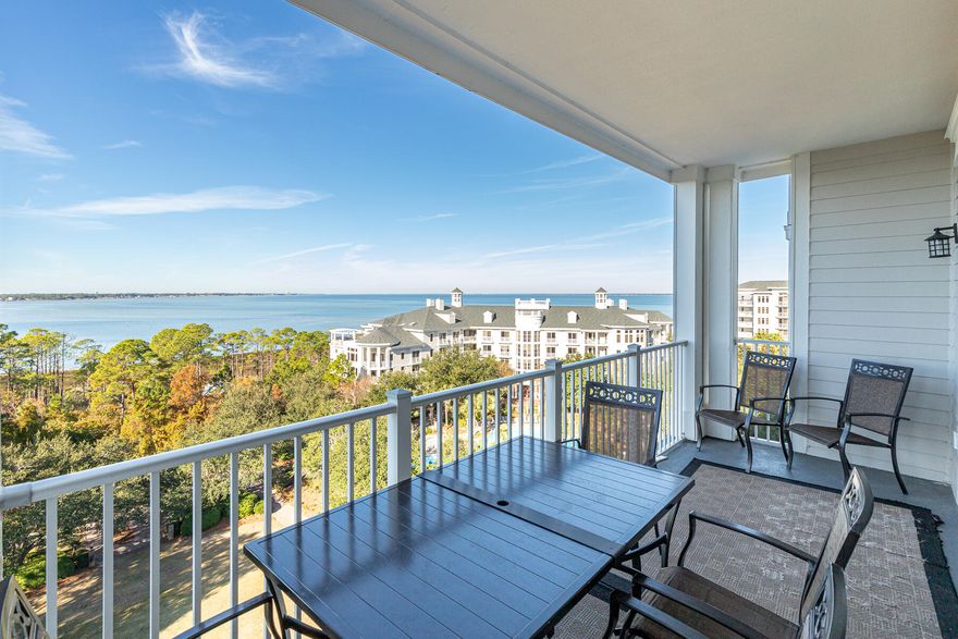 Welcome to this captivating condo, perfectly positioned on the 8th floor of the Grand Sandestin. From the moment you step inside, you'll be drawn to the stunning panoramic views of the Choctawhatchee Bay, and with its west-facing orientation, prepare to be mesmerized by some of the most beautiful sunsets on the Emerald Coast. The spacious interior offers a functional layout designed for comfort and ease. The kitchen, featuring cherry cabinets, stainless steel appliances, and granite tile countertops, blends practicality with style, making it perfect for everyday use. The open concept living area flows seamlessly to the dining space, creating an inviting atmosphere for relaxation or hosting friends and family. A built-in wet bar adds a casual touch for entertaining, while the large windows ensure you never miss a view.

Retreat to one of the two master suites, each offering calming bay views and private ensuite baths ideal for unwinding after a day of adventure. A third bedroom with two queen beds and an adjacent full bath ensures there is plenty of room for guests.

This property is an incredible opportunity whether you are searching for a second home, primary residence, or investment property. Its location near the Village of Baytowne Wharf and the Convention Center means your moments away from dining, shopping, and vibrant entertainment. The Grand Sandestin also offers a resort-style pool, a welcoming lobby bar, an exercise room, and beautifully manicured Grand Gardens for you to enjoy.

This property and experience are a blend of comfort, convenience, and potential in this sought-after coastal community within the gates of Sandestin Golf and Beach Resort.

As an introduction to the Sandestin lifestyle, we invite our new owners to explore amenities that make Sandestin special. The listing brokerage and seller(s) are presenting the buyer(s) of this property with (2) 90-minute rounds of Tennis court time, a golf foursome at one of our three championship courses, and a round of golf for up to four (4) players at the unrivaled Burnt Pine Golf Club.

Sandestin Golf and Beach Resort features more than seven miles of beaches and pristine bay front, four championship golf courses, 15 world-class tennis courts, a 226-slip marina, a fitness center, spa and celebrity chef dining. Shop, dine and play at the charming pedestrian village, The Village of Baytowne Wharf and more. Inside the gates of the resort, residents enjoy a balanced lifestyle of high-class living, spanning the 2,400 acres from the beach to the bay. Everything within the gates of the resort is accessible by golf cart or bicycle. The entire resort is interconnected by miles of pedestrian, bike and golf cart paths that weave through groves of live oaks, meandering past natural lagoons, fountains, man-made lakes, and meticulously landscaped fairways.
