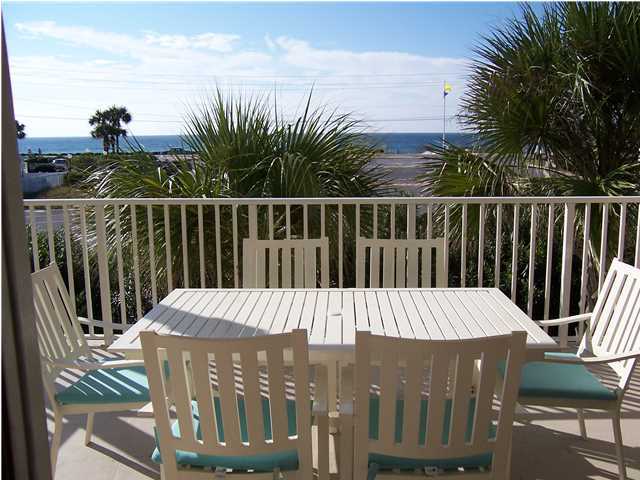Beautiful second floor unit approximately 400 ft from the beach with great gulf views from the living/kitchen area, master bedroom and the large covered balcony. The floor plan is spacious and functional with a tastefully designed interior. Unique features include a large balcony off the living room and master bedroom, crown molding, full size laundry room, separate private storage unit and oversized enclosed tandem garage on the first level. Pavilion Palms is a gated community, pet friendly with a large pool that has the gulf just across the street at Miramar Park. Buyer to verify all information.