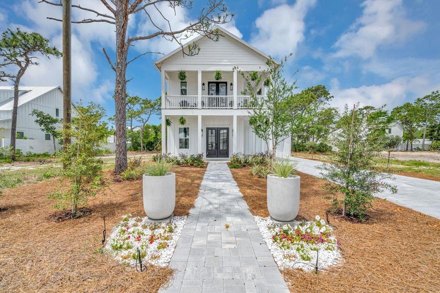 Price reduced! Beautiful new construction home, and stunning new coastal furniture, entirely furnished! This includes new washer and dryer as well. Beautiful bedding and bathroom linens included. Less than four blocks from the beach! Five bedrooms all come with a private bathroom and an extra one-half bath on the main level. Open floor plan living area and kitchen on the main floor with ten-foot ceilings. The living area opens to a covered porch to enjoy the outdoors. Primary suite on the main level for convenience. Also, a mud room with a door to the outside for beach traffic. Fully equipped kitchen with gas stove. Upstairs you will find four additional bedrooms plus an office/bunk room all with ten-foot ceilings. French doors lead to wrap wrap-around balcony to enjoy the gulf breezes. Oversized garage perfect for extra storage for paddle boards and water toys or even a golf cart. New, freshly landscaped that adds a special touch.