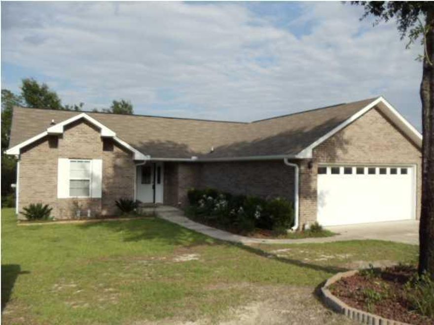 Cute split floor plan with three bedrooms, two baths featuring nice kitchen with pantry, breakfast bar, vaulted ceiling in living room, treyed ceiling in master. Mud room / laundry room offers extra pantry.