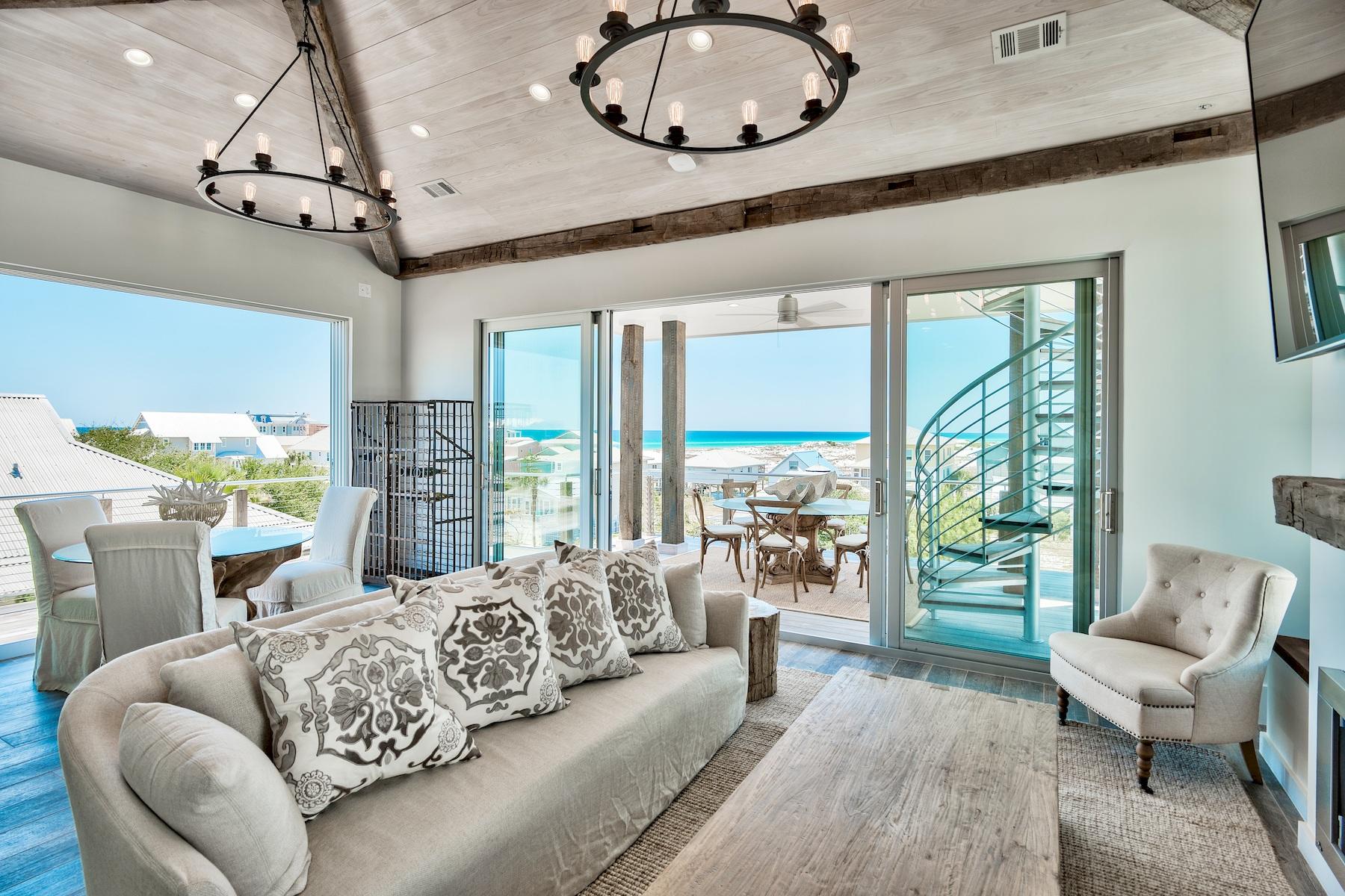 Discover a one of a kind, modern 4 bedroom, 4 bathroom masterpiece in sought after Grayton Beach. Boasting forever Gulf and coastal dune lake views this is a home that exceeds the expectations of modern luxury. Meticulously designed with unparalleled attention to detail and style, revel in the truly decadent outdoor living areas, including a sparkling heated private swimming pool, beautiful balconies and porches to soak in the views and a rooftop deck with Kitchen Aid gas grill, ideal for dining alfresco and watching the gorgeous Florida sunsets over the Gulf. Inside you will find porcelain tile, solid pine doors, Nest thermostats and Sonos speakers throughout, custom staircase with metal beams wrapped in reclaimed wood and a private elevator leading you through the 3 levels.