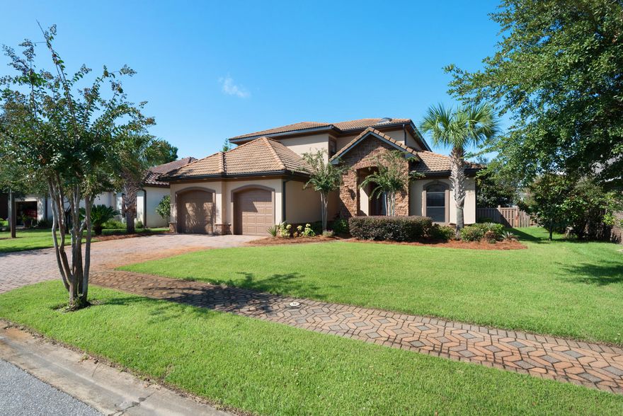 Looking for a great family home, with an excellent location that is close to shopping, restaurants and all of the area's schools, this spacious 5 bedroom home in the popular, family friendly, Mussett Bayou Estates,  this home will not disappoint! From the elegant foyer leading to a large family room and kitchen, to the large screened in lanai overlooking the fenced in yard, this home really does have it all. The large master suite is on the main level and boasts a large walk in closet, dual vanities, separate shower and tub in the bath. Also on the main level, is a spacious office. A beautiful staircase leads upstairs to the secondary bedrooms and bath. Upgrades galore, including extensive crown moulding, 8 foot solid doors,granite counters, stainless steel appliances and more.