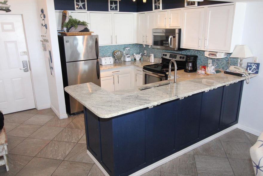 Gorgeous unit on the 6th floor.  Completely remodeled included tub/showers in both bathrooms.  Large gray tile throughout including the balcony.  Shaker cabinets in kitchen and baths. Unit comes   completely furnished.