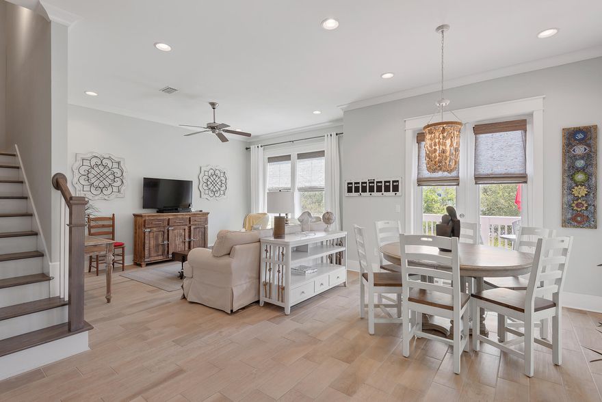 Welcome to 57 Milestone Drive, Unit B; with light and open spaces complemented by a casual coastal style at this inviting 3BR/2.5BA townhome in the Prominence community... located by all that 30A has to offer including The Hub just steps away. This home welcomes you in with a spacious open-concept living and dining area, which is highlighted by 10' ceilings, ample windows, low-maintenance wood grain tile flooring, and coastal-inspired lighting fixtures. The fully equipped kitchen overlooks the living and dining area and features granite countertops including a large center island with seating for four, white cabinetry, a subway tile backsplash, and stainless steel appliances with a gas cooktop and oversized refrigerator.