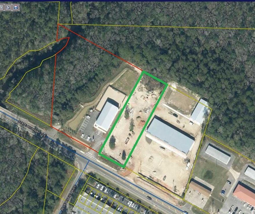 PRIME COMMERCIAL LAND FOR SALE - FREEPORT, FL. Exceptional 1-acre vacant commercial parcel with excellent visibility near 779 E Hwy 20 in the heart of Freeport's growing business district. Located across from the Freeport Walton County Municipal complex (Planning & Building Dept. and Sheriff's Office) and near the signalized intersection of E Hwy 20 and Blue Ridge Parkway, providing direct access to Publix-anchored retail, professional offices, and surrounding commercial uses. Minutes to Hammock Bay and approximately 15 minutes to Scenic Hwy 30A beaches, dining, and shopping. Ideal for retail, office, medical, or service-oriented development. High-growth area with strong traffic counts and long-term upside. All information is deemed reliable; buyer to verify for its own use.