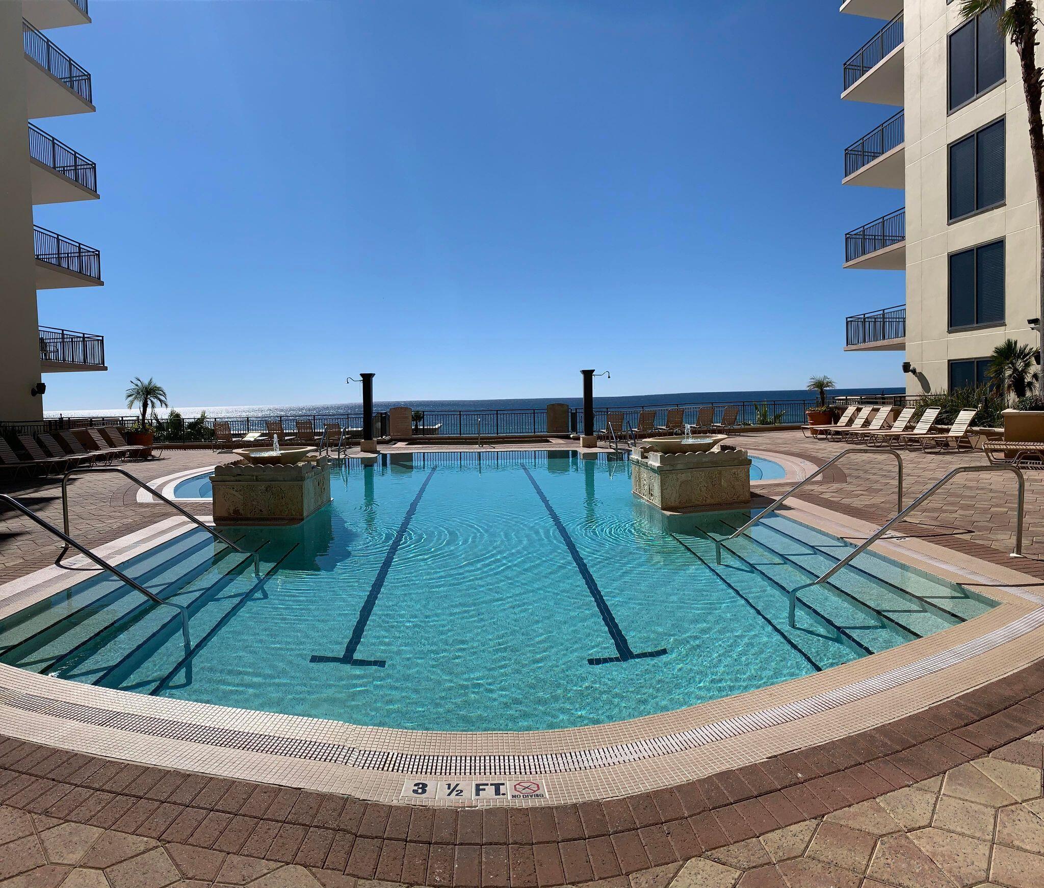 The only studio currently on the market at Origin!WOW what a beautiful view of the Bay, nature and Pier Park! Check out this studio with new LVP flooring with a Bay View and located right across the street from the beach with direct beach access, how often can you find a gem like this? There's a king bed, sleeper sofa, two refrigerators and you'll get to enjoy being steps away from the beach. This is a great home away from home and/or rental property. What a great opportunity to kick off the new year with an investment property and have the ability to earn rental income.. The water heater was installed in 2021.