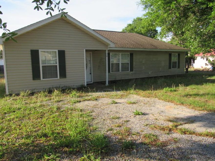 Looking for a home conveniently located near Defuniak Springs? This may be the one! Home is only ten years old and priced to sell. City water and septic. Home has tile and carpet floors, central HVAC, living room has trayed ceiling giving it an open, cheery feel. Ceiling fans in bedrooms and living room. Recessed lighting in some rooms. Kitchen has work island with drawer storage and barstool area, cherry color cabinets, dining area, kitchen, and Living Room are all open. French doors to back patio. Split bedroom floor plan. Master bath has tub/shower and double vanity. Master BR has cathedral ceiling & spacious walk in closet. Hallway has a big walk in closet with plenty of shelves. Back yard has privacy fence that needs a little work. 8x10 storage shed with electric.