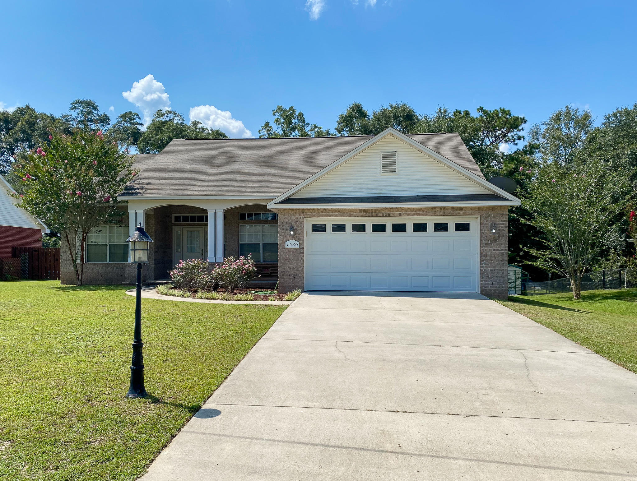 Come and see this 3 bedroom 2 bathroom, all brick, split floor plan home that was previously a Parade of Homes Winner! This home is located on a large lot in Baker and is just minutes away from the school. The kitchen is equipped with stainless steel appliances including a smooth top stove with self cleaning oven, built-in microwave, dishwasher and refrigerator with ice maker. Additionally it features a breakfast bar, pantry, custom cabinets and low maintenance tile flooring. Just off the kitchen is a formal dining room for additional eating space. The focal point of the living room is a corner gas fireplace with tile surround and soaring 10' ceilings. The master suite features a large walk-in closet and an ensuite with a double vanity, corner whirlpool tub, and a (click more)