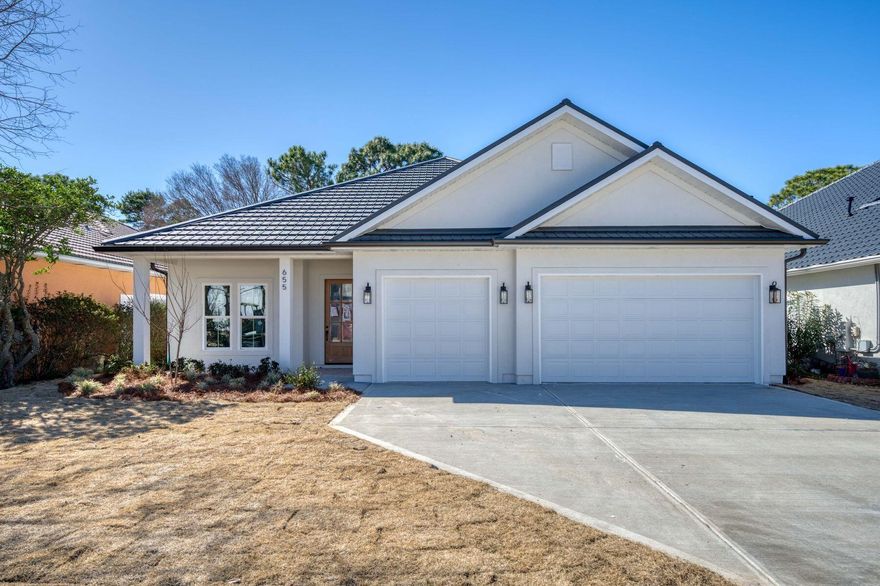 Elegant Golf-View Ranch Home With Outdoor Living.This stunning five-bedroom, four-bathroom home with a three-car garage is located in the serene Emerald Bay Golf Club community and is just moments from the clubhouse and neighborhood amenities.A creamy Greek villa stucco exterior, an eight-foot wood front door, and tiled porches make a perfect place to enjoy your morning coffee. As you step into the home, you are met with picturesque fairway views. The main living space features a triple sliding glass door that leads to a screened porch with a custom outdoor kitchen, ideal for indoor-outdoor living and entertaining.Spend evenings in front of the beautiful fireplace, surrounded by seaglass and shiplap detailing. The formal dining room showcases custom millwork throughout, offering an inviting space for hosting family dinners. The spa-like master bathroom boasts a shimmering blue herringbone accent tile, along with dual vanities.

With its functional single-story layout, modern fixtures/ finishes, and desirable golf course setting, this home offers a well-balanced blend of style, comfort, and location within Emerald Bay.

The home is currently under construction and receiving its final finishing touches. The builder can close in 30 days.