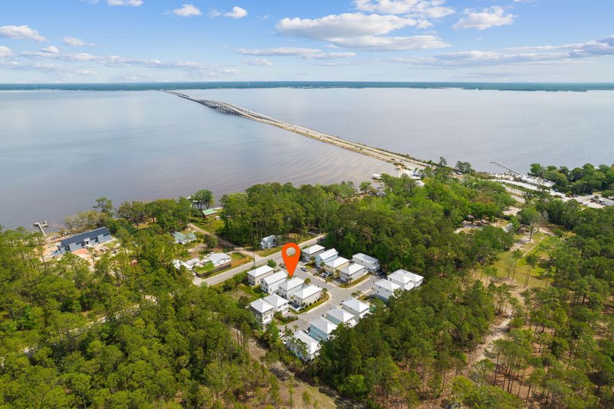 $20,000 Seller credit to Buyer for Closing Cost and/or Down Payment. One block from the Bay and close to schools, beaches, restaurants, and shops of 30A. This open floor plan, has 1,777 sq ft, 3 bedrooms, 2 full baths, 1 half bath, fenced in back yard, patio, and single garage. The main floor with 9' ceilings, shiplap accents, ceramic wood flooring on the first floor & new LPV upstairs. Half bath on 1st floor for guest. The large quartz peninsula with counter seating & lovely Dining Area makes room for everyone. The 2nd floor Master suite with walk in closet, sitting area, soaking tub, separate shower, and double vanities. Two guest rooms, a full bath with tub/shower configuration and over-sized laundry room complete the second floor. Private community pool and walking distance to the 331 Bay Park, Farm&Fire, The Bay & N. Beach Social restaurant. Also, catch the Free Shuttle to Seaside from the Park & Ride on 331! 