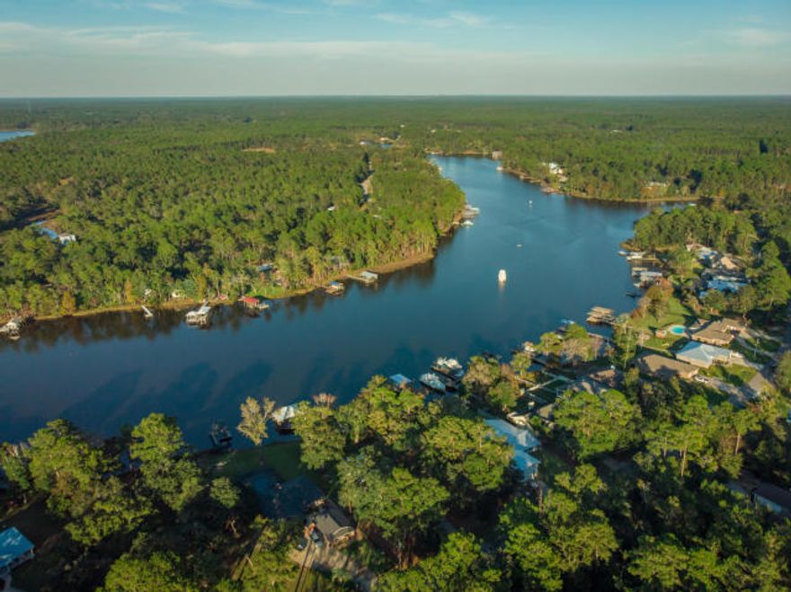 Calling all water lovers! This homesite is an open slate for someone wanting a beautiful water view as well as a pier and boat. Enjoy Boating, jet-skiing, kayaking, fishing, or YOLO everyday. Choctawhatchee Bay in your back yard, access to the gulf by water or a drive over the bridge for toes in the sand. Not many of these waterfront sites left, this size & large boat access.