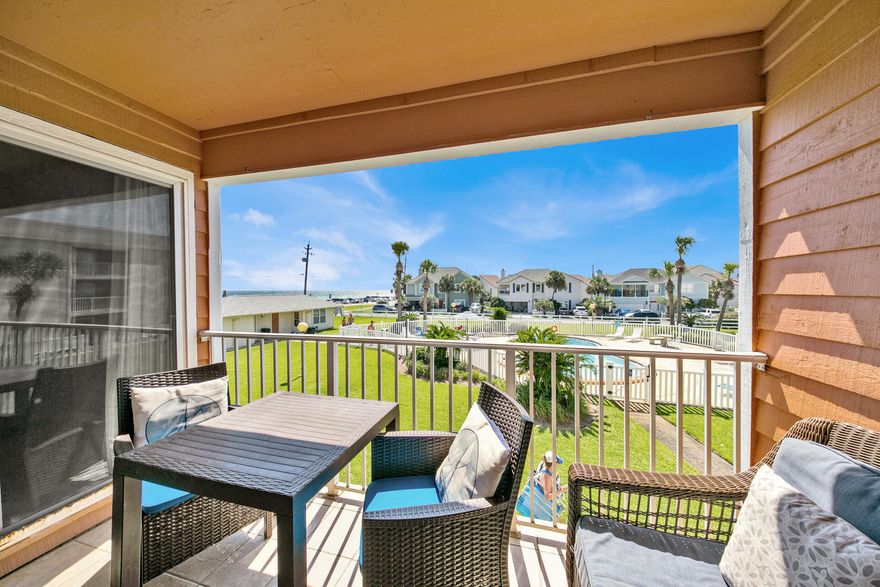 MULTIPLE PATIOS/MULTIPLE GULF VIEWS! This is a rare, Scenic 98 unit that offers both east and west side patios and both have views of the Gulf of Mexico! Located within the Tradewind condominium complex, some locals view this building as the best this fabulous 5 mile stretch of road has to offer. Three beach access, Pompano Joes, a 5 mile walk/bike path and a courtyard pool within easy walking distance of all, gives this argument tremendous clout.In addition, over 800 sq ft of living area makes this unit ideal for spreading out or accommodating multiple families.  Updated appliances including Stainless Steel in the kitchen  and front loading washer and dryer, give the unit fresh feel. The bathrooms have been tastefully remodeled with new showers and vanities.  Kids will love the bunk room