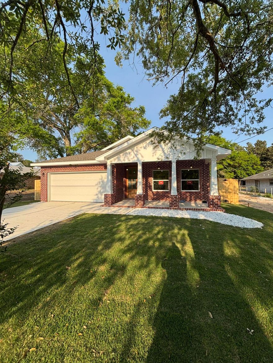 This beautiful 4-bedroom, 3-bath brick home combines timeless design with modern touches. A custom 8-foot mahogany wood front door sets the tone for the quality and charm found throughout. The kitchen is equipped with an oversized fridge and freezer, complemented by a wet bar and separate drink fridgeperfect for entertaining.The primary suite offers a floor-to-ceiling tiled shower, a 6-foot soaking tub, private water closet, and separate his and her closets.Outside, enjoy a large, gorgeous oak tree filled yard with a spacious back porch, RV pad with a double gate, and room to add a pool. A two-car garage provides secure parking and storage. This home is a perfect mix of comfort, luxury, and functionality.